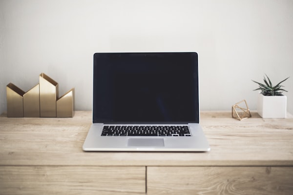 Hacker at computer representing room takeover operations