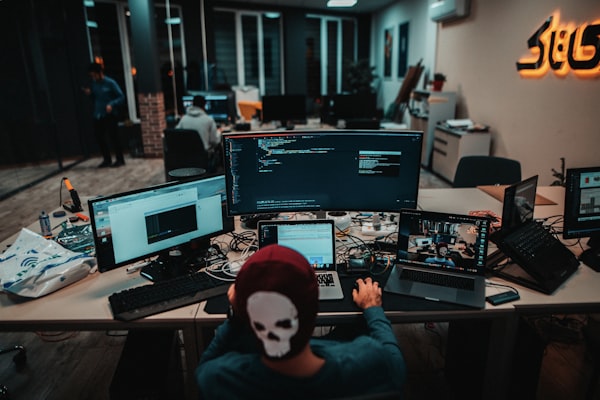 Vintage computer setup reminiscent of late 90s hacking culture